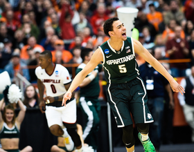 Michigan State celebrates on Carrier Dome floor after Elite Eight win over Louisville