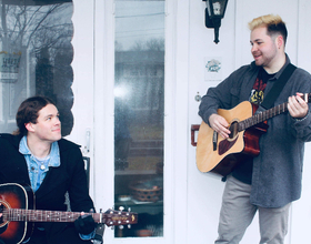 Experimental acoustic duo performing original songs at Funk 'n Waffles