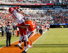 Liberty head coach Hugh Freeze coaching in a hospital bed versus Syracuse