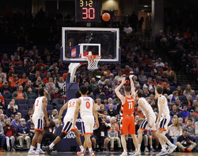 Syracuse upsets No. 18 Virginia, 63-55, with OT scoring outburst