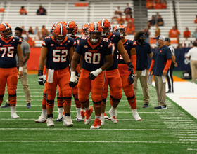 SU defensive coordinator, offensive line coach will return in 2022