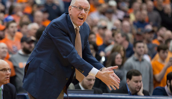 Why did the NCAA give Syracuse basketball 4 scholarships back?