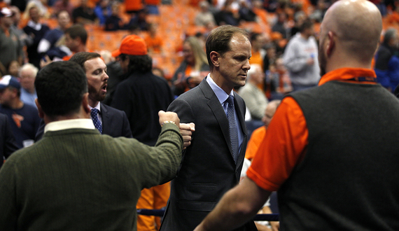 Mike Hopkins will coach his 1st game ever on Saturday against Georgetown