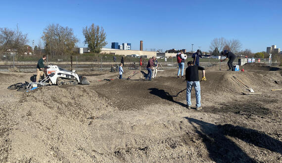 100 volunteers unite to build the only pump track in Syracuse