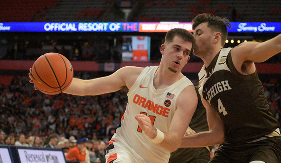 &#8216;Determined&#8217; Joe Girard wills Syracuse to 70-69 win over Louisville