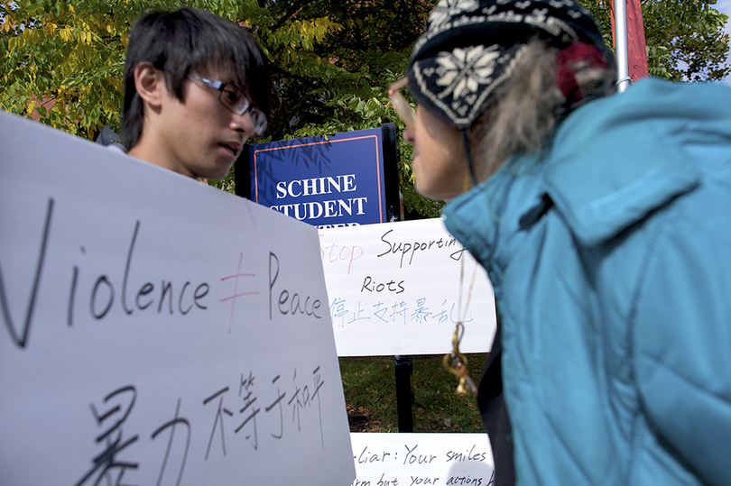 Students protest Dalai Lama&#8217;s visit outside of SU student center