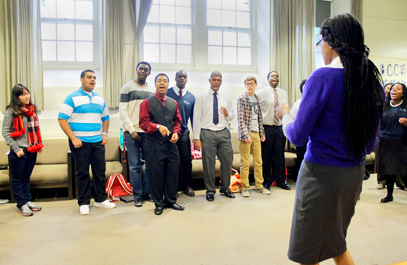 The Black Celestial Choral Ensemble puts in work on stage, in the community