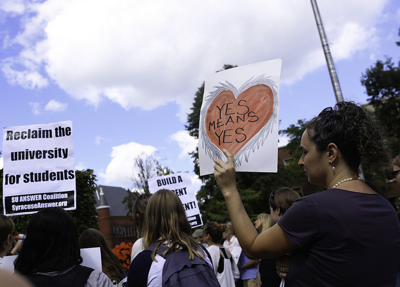 Students, staff and faculty march to Syverud&#8217;s office to voice concerns about changes to sexual assault services