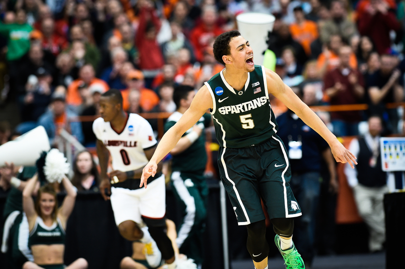 Michigan State celebrates on Carrier Dome floor after Elite Eight win over Louisville