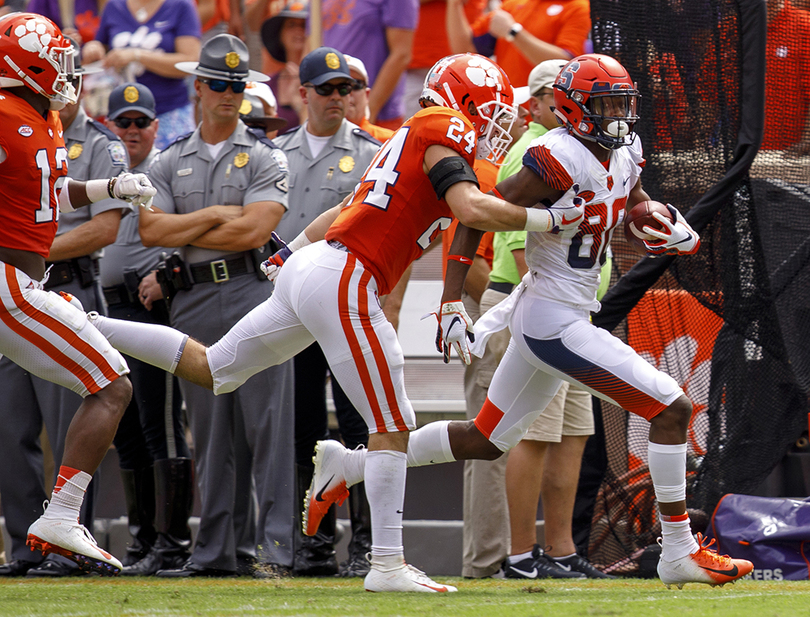 Before Taj Harris could catch touchdowns, he needed to block