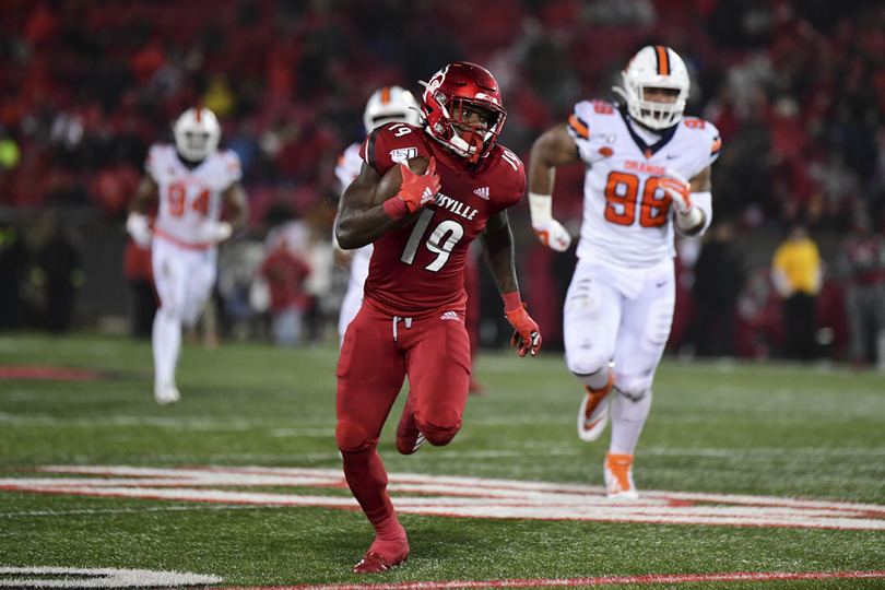 Louisville offense runs past Orange &#8216;like a track team’ in 56-34 victory