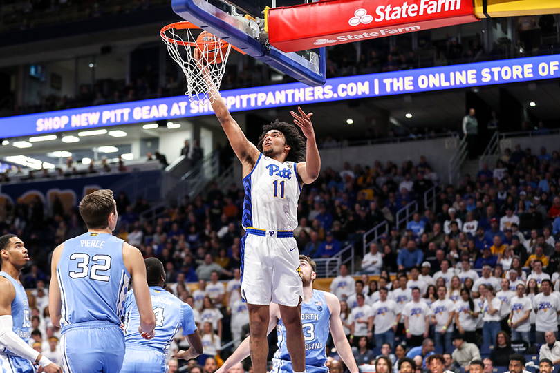 Justin Champagnie leads Pitt in scoring and rebounding as a freshman