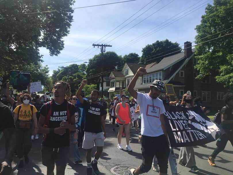 Last Chance for Change demonstrators march through SU campus