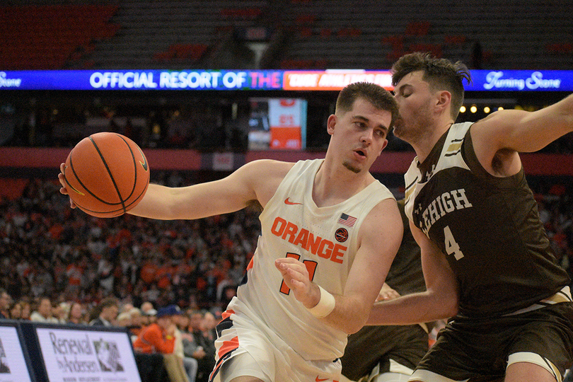 &#8216;Determined&#8217; Joe Girard wills Syracuse to 70-69 win over Louisville